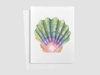 Colorful moonrise shell illustration on a white card with a white envelope.