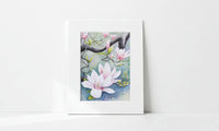 Matted artwork of pink flowers on a light gray background