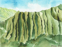 Watercolor painting of a green Ko'olau mountain landscape with a blue sky.